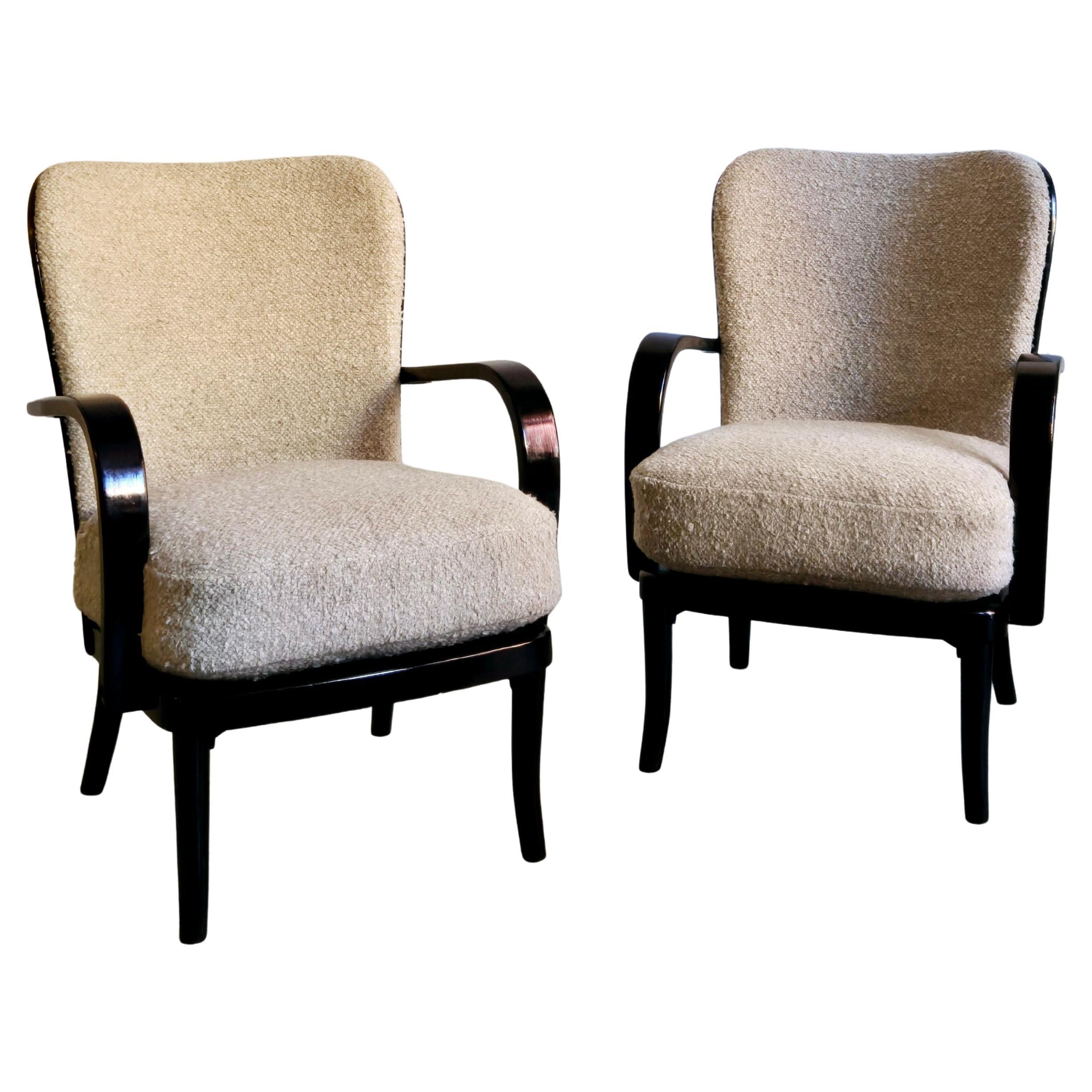 Werner_West,_a_pair_of_armchairs,_Scandinavian_Modern._Re-upholstered_in_bouclé.