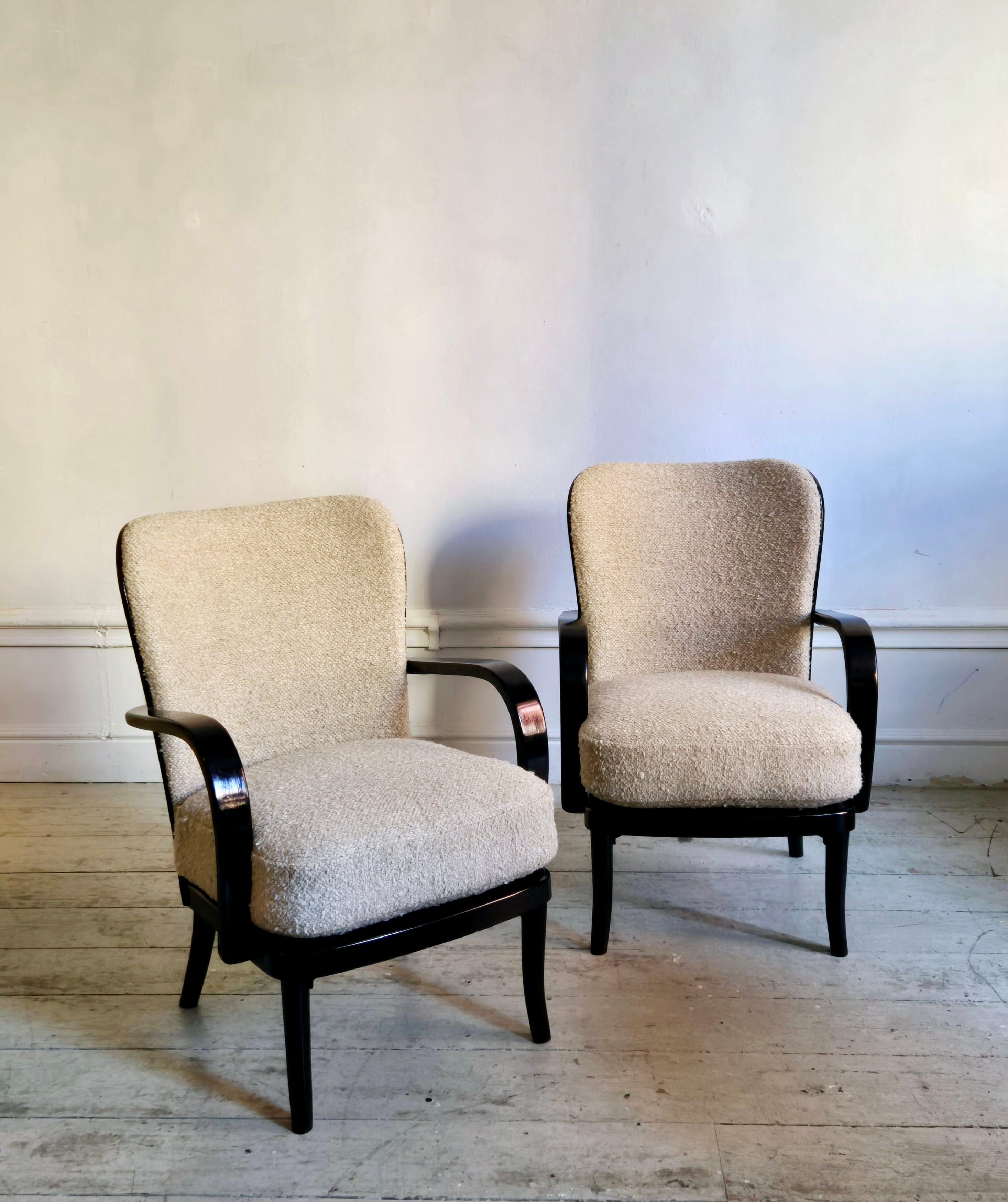Werner_West,_a_pair_of_armchairs,_Scandinavian_Modern._Re-upholstered_in_bouclé.