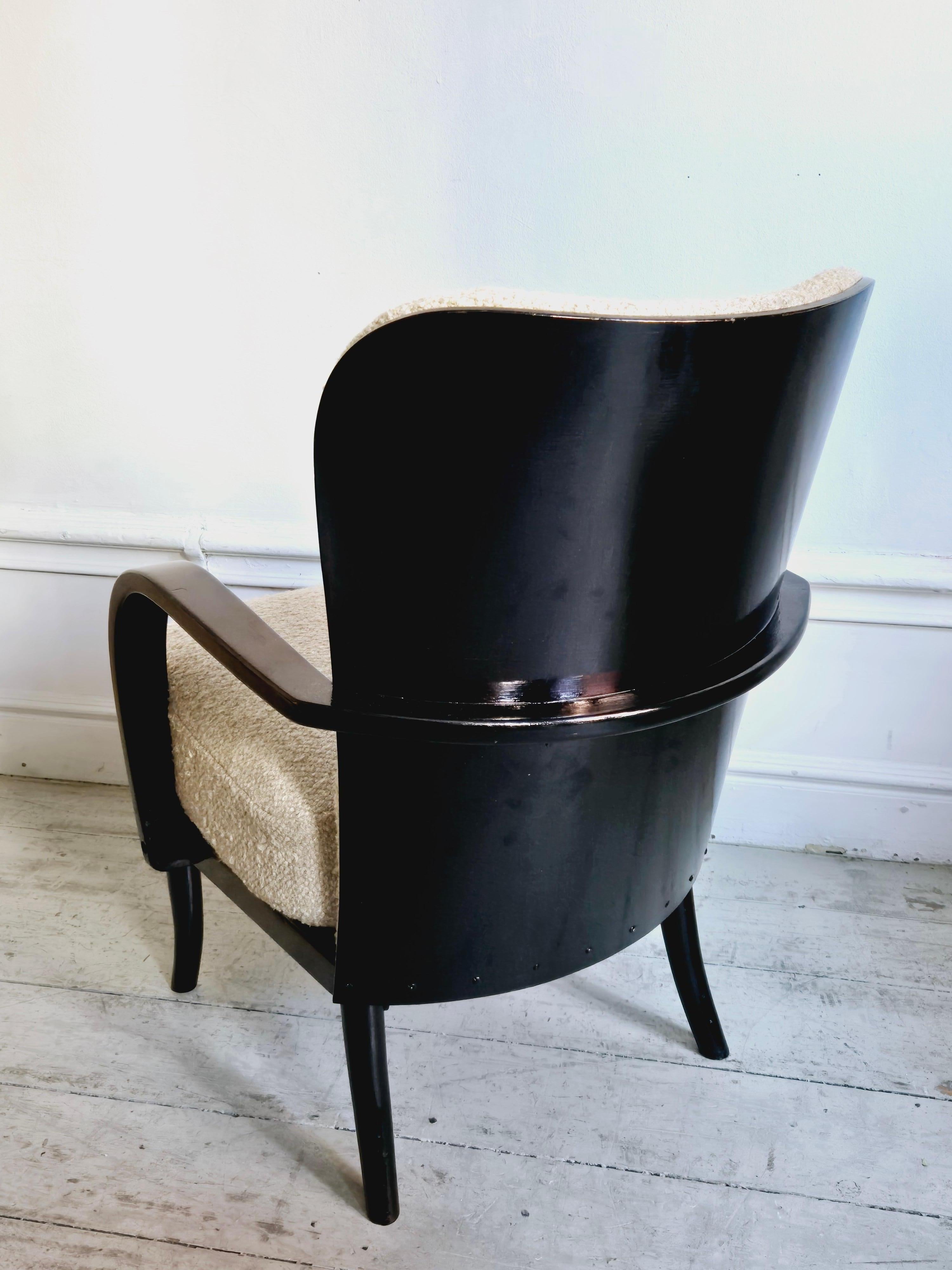 Werner_West,_a_pair_of_armchairs,_Scandinavian_Modern._Re-upholstered_in_bouclé.