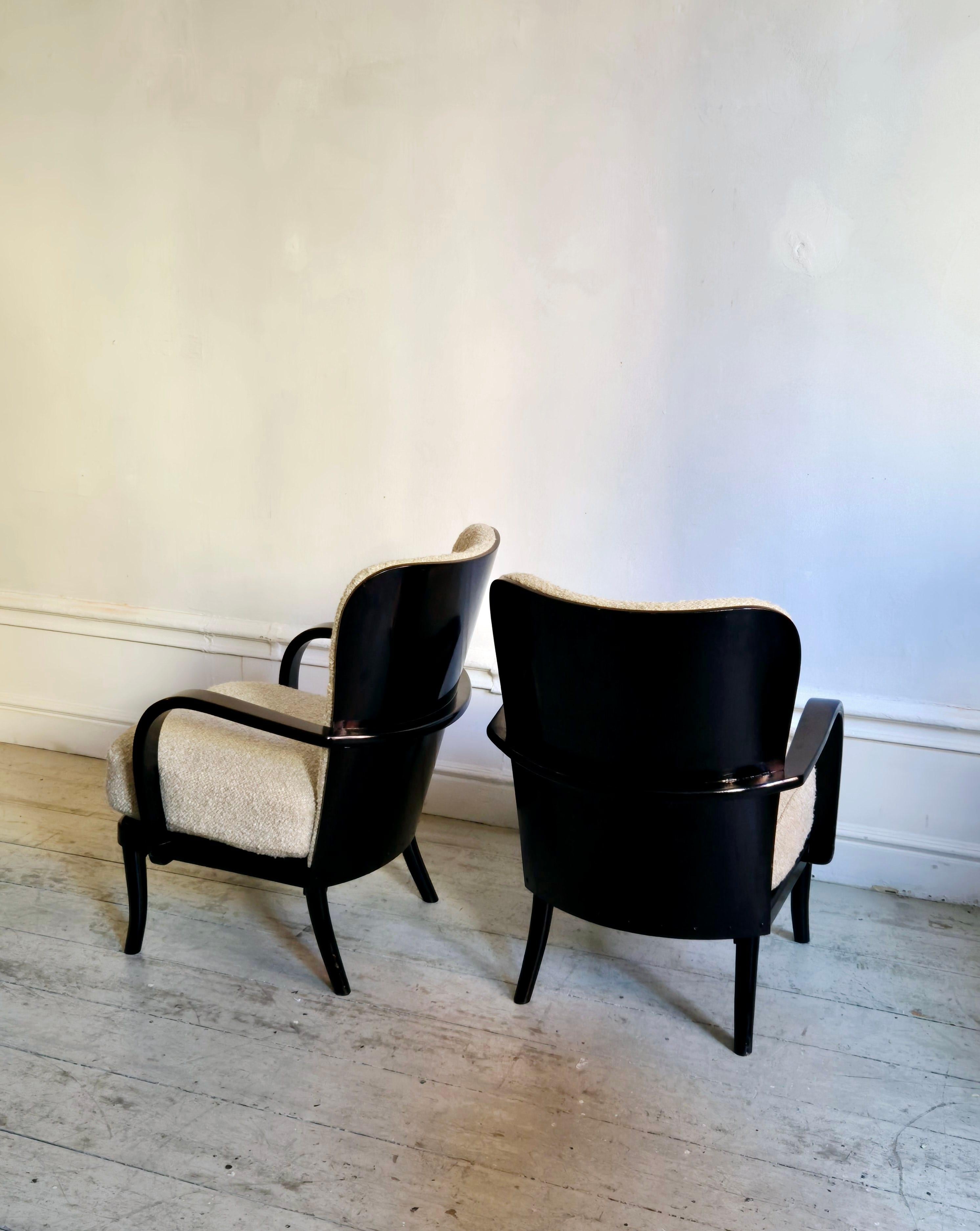 Werner_West,_a_pair_of_armchairs,_Scandinavian_Modern._Re-upholstered_in_bouclé.