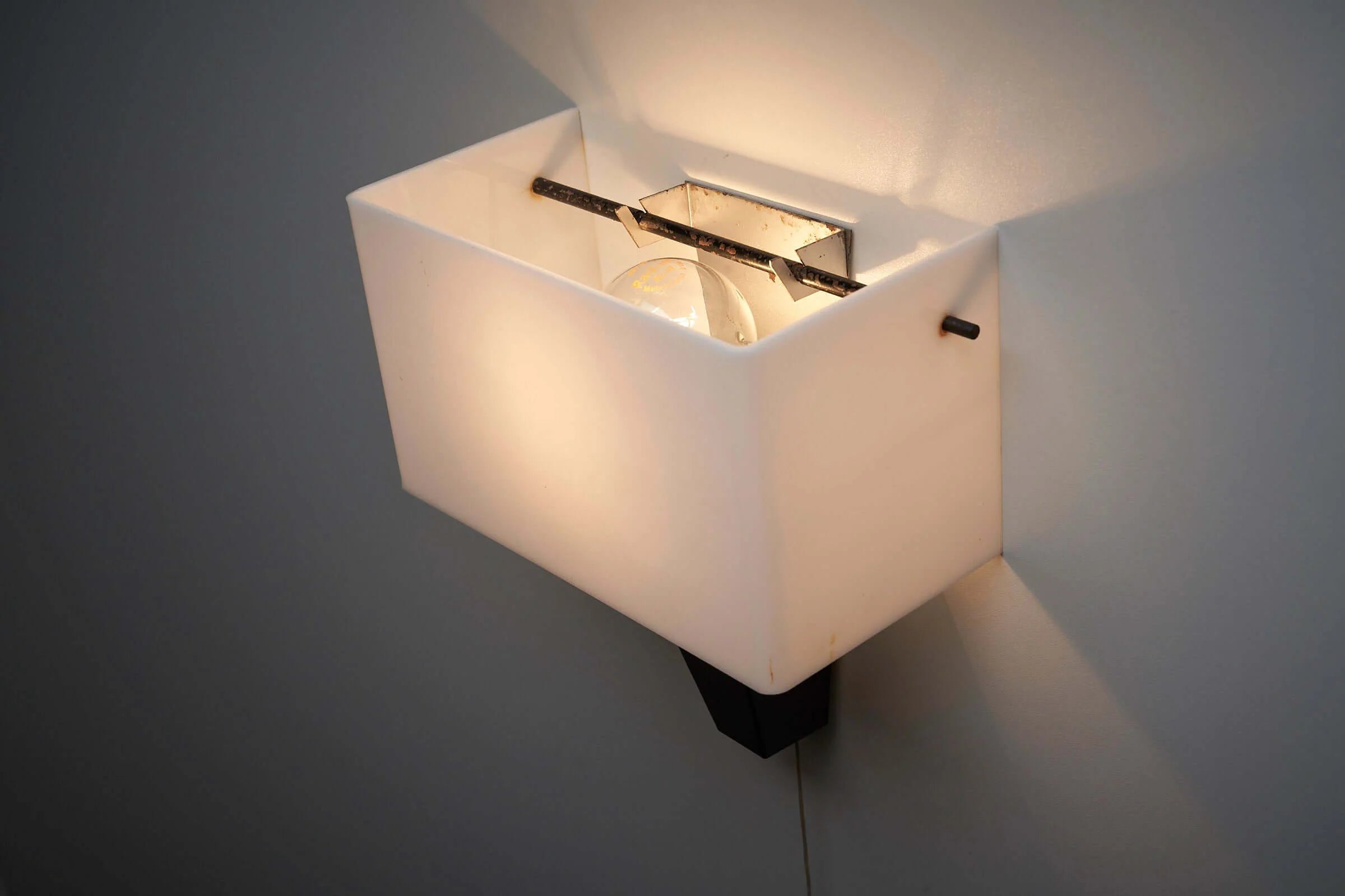 Abstract_Wall_Sconces_In_Plexi_Metal