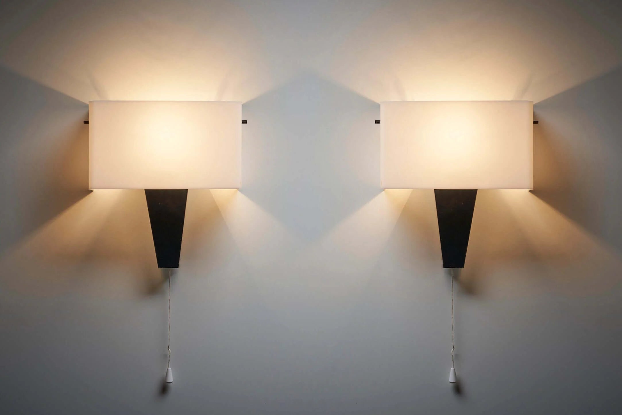 Abstract_Wall_Sconces_In_Plexi_Metal