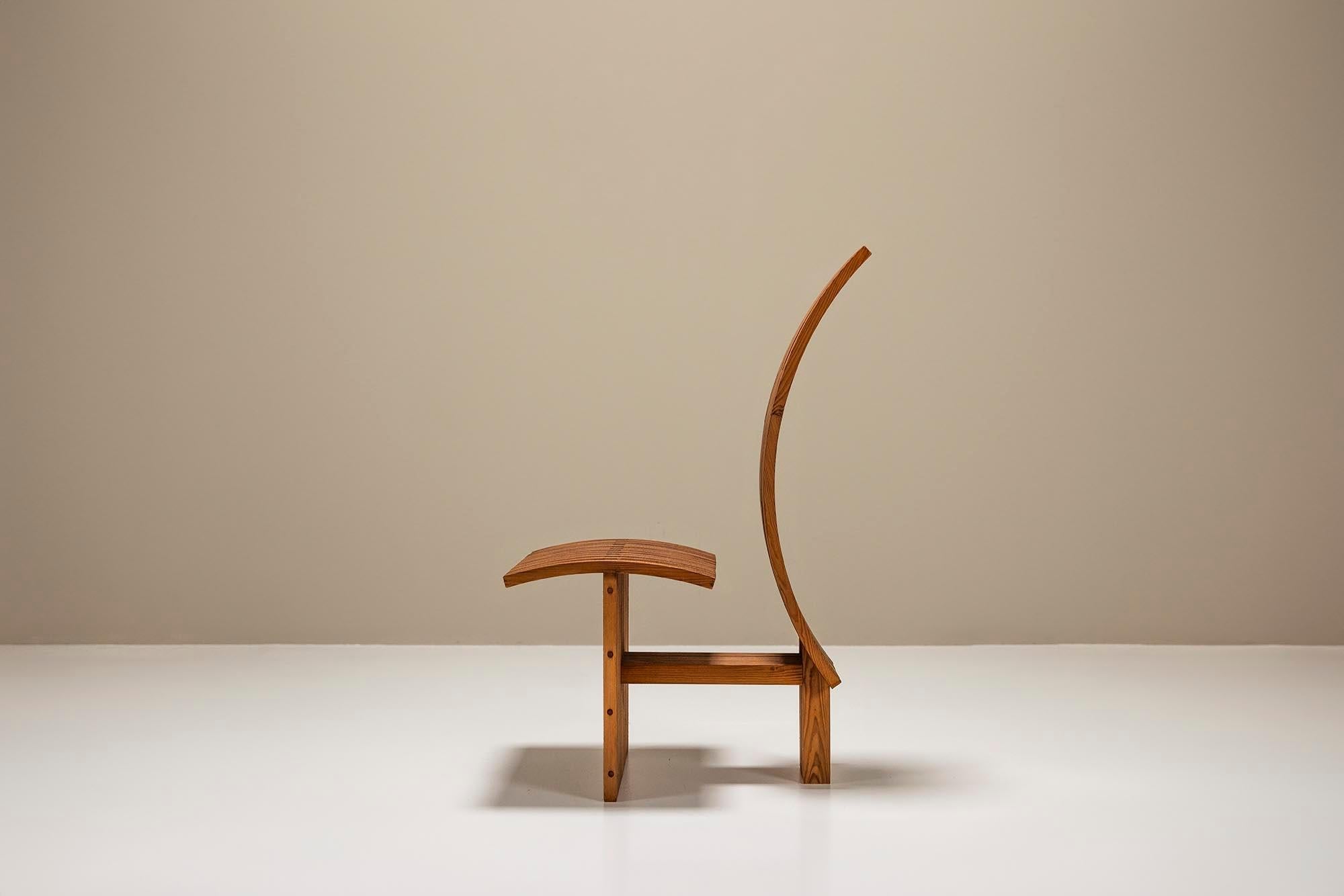 Architectural_Curved-back_Chair_in_Wood_1980s