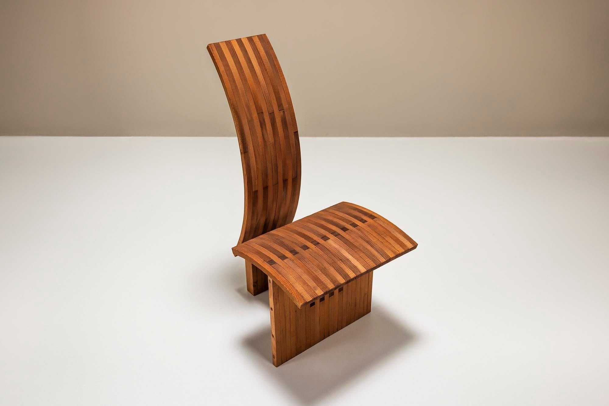 Architectural_Curved-back_Chair_in_Wood_1980s