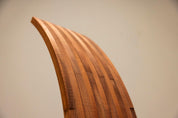 Architectural_Curved-back_Chair_in_Wood_1980s