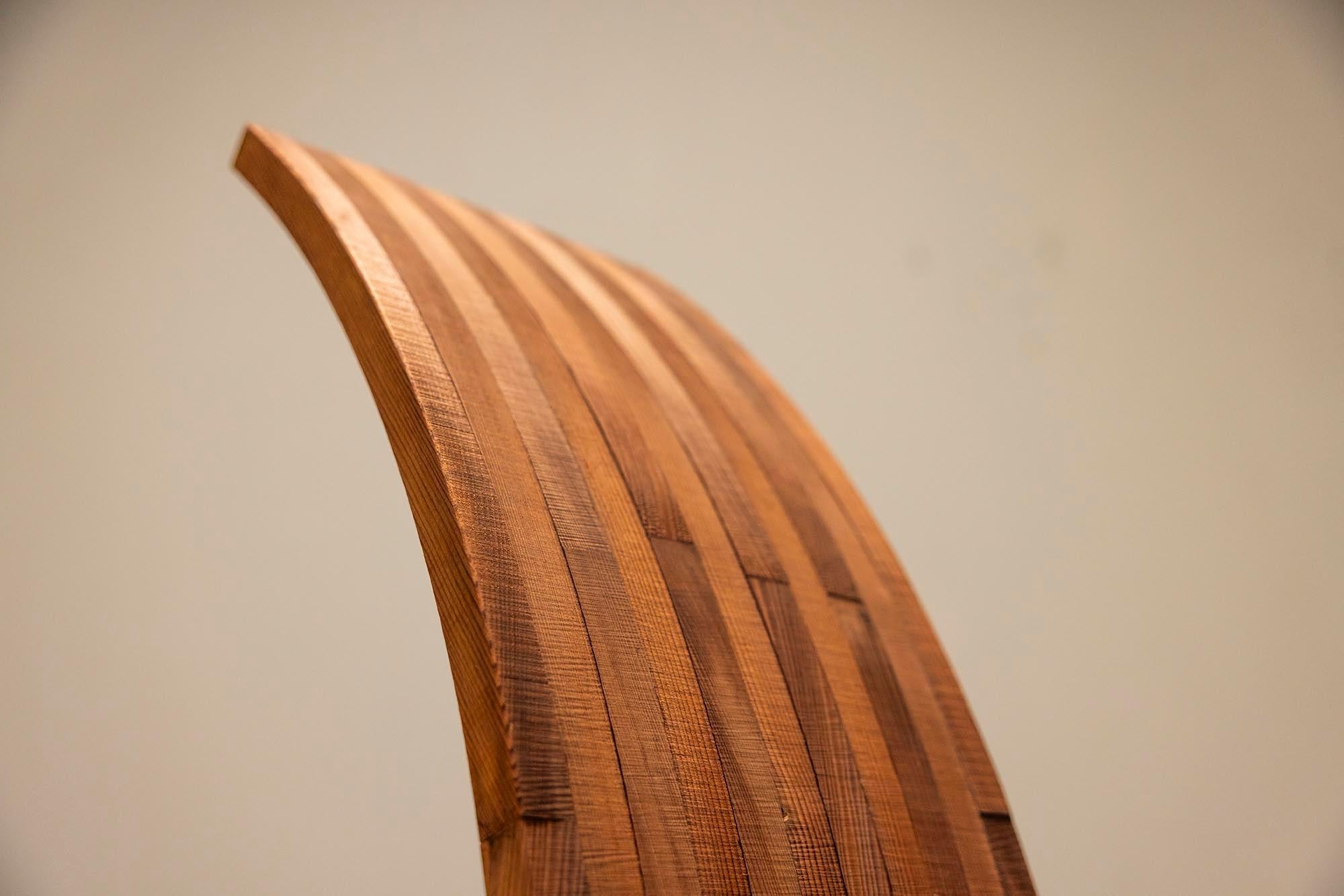 Architectural_Curved-back_Chair_in_Wood_1980s