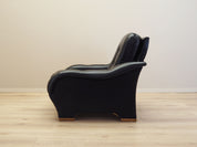 Black_armchair_Italian_design_1980s_production_Italy