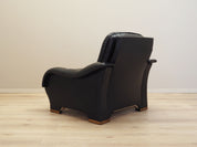 Black_armchair_Italian_design_1980s_production_Italy