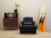 Black_armchair_Italian_design_1980s_production_Italy