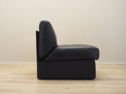 Black_leather_pouffe_armchair_Italian_design_1960s_production_Italy