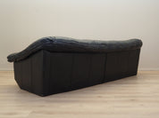 Black_leather_sofa_Italian_design_1960s_production_Italy