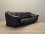Black_leather_sofa_Italian_design_1960s_production_Italy