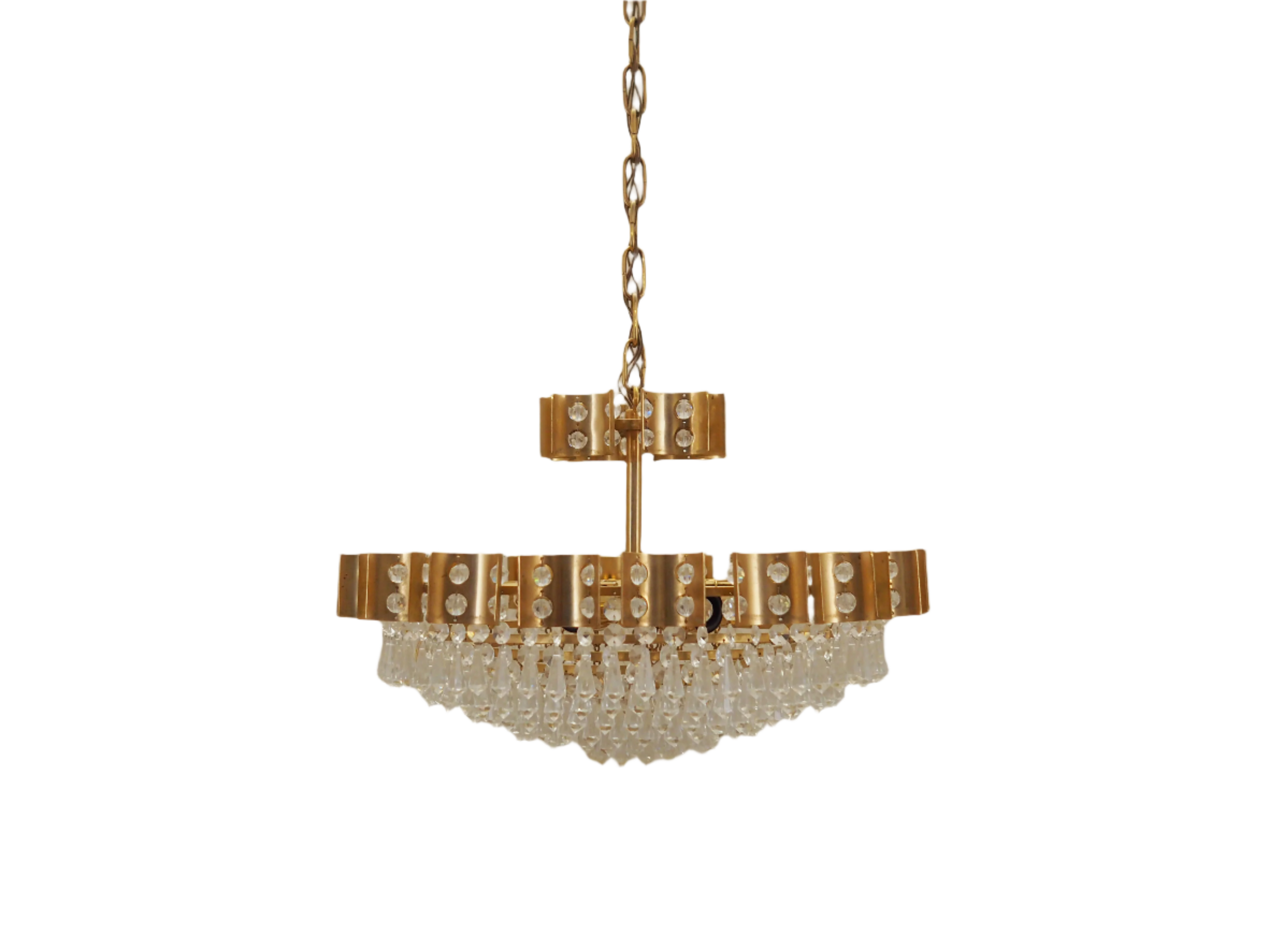 Brass_chandelier_in_Danish_design_1970s_production_Denmark
