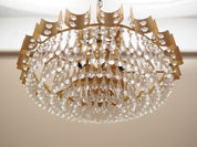Brass_chandelier_in_Danish_design_1970s_production_Denmark