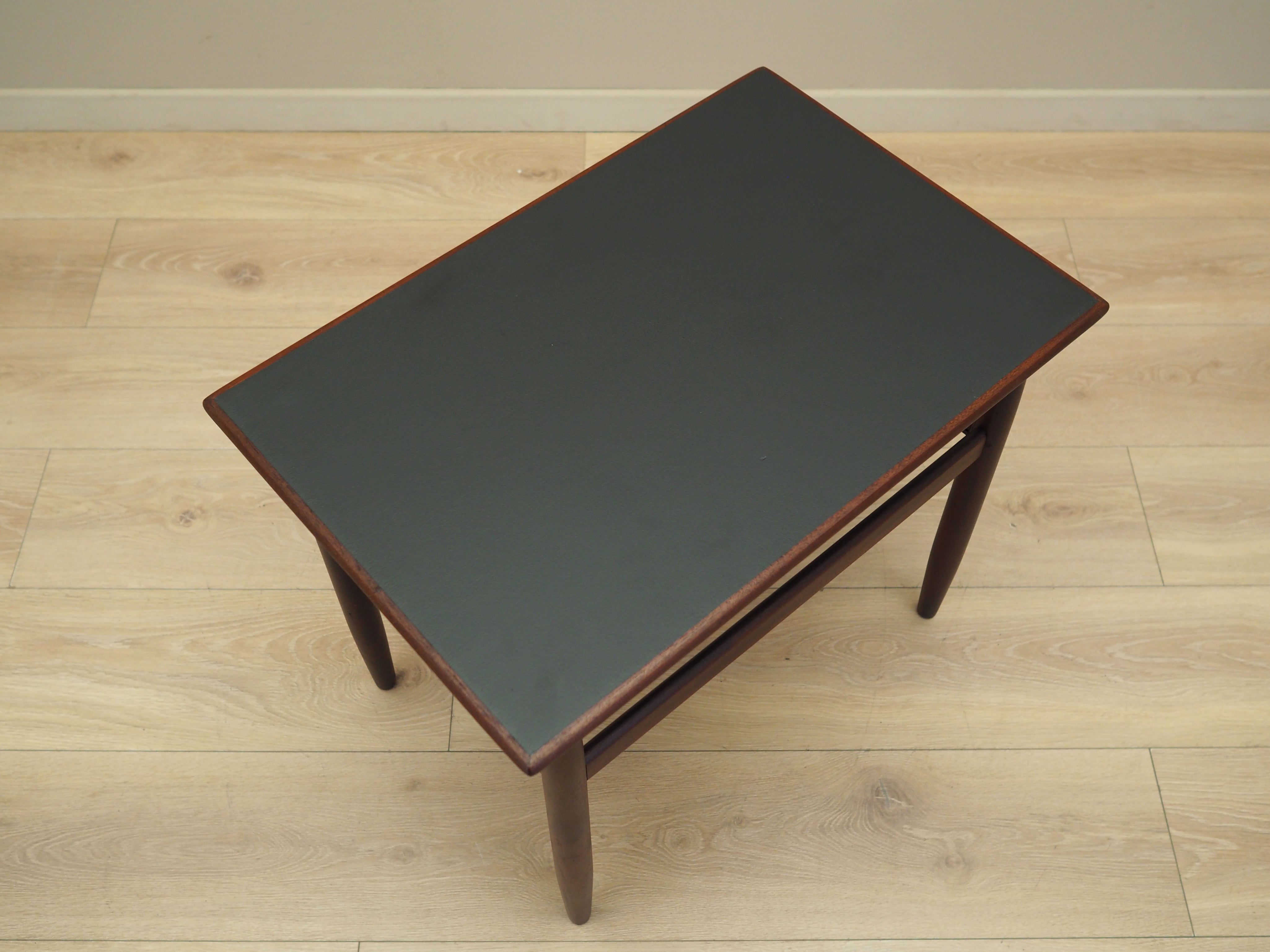 Brown_Teak_coffee_table_in_Danish_design_1970s_production_Denmark