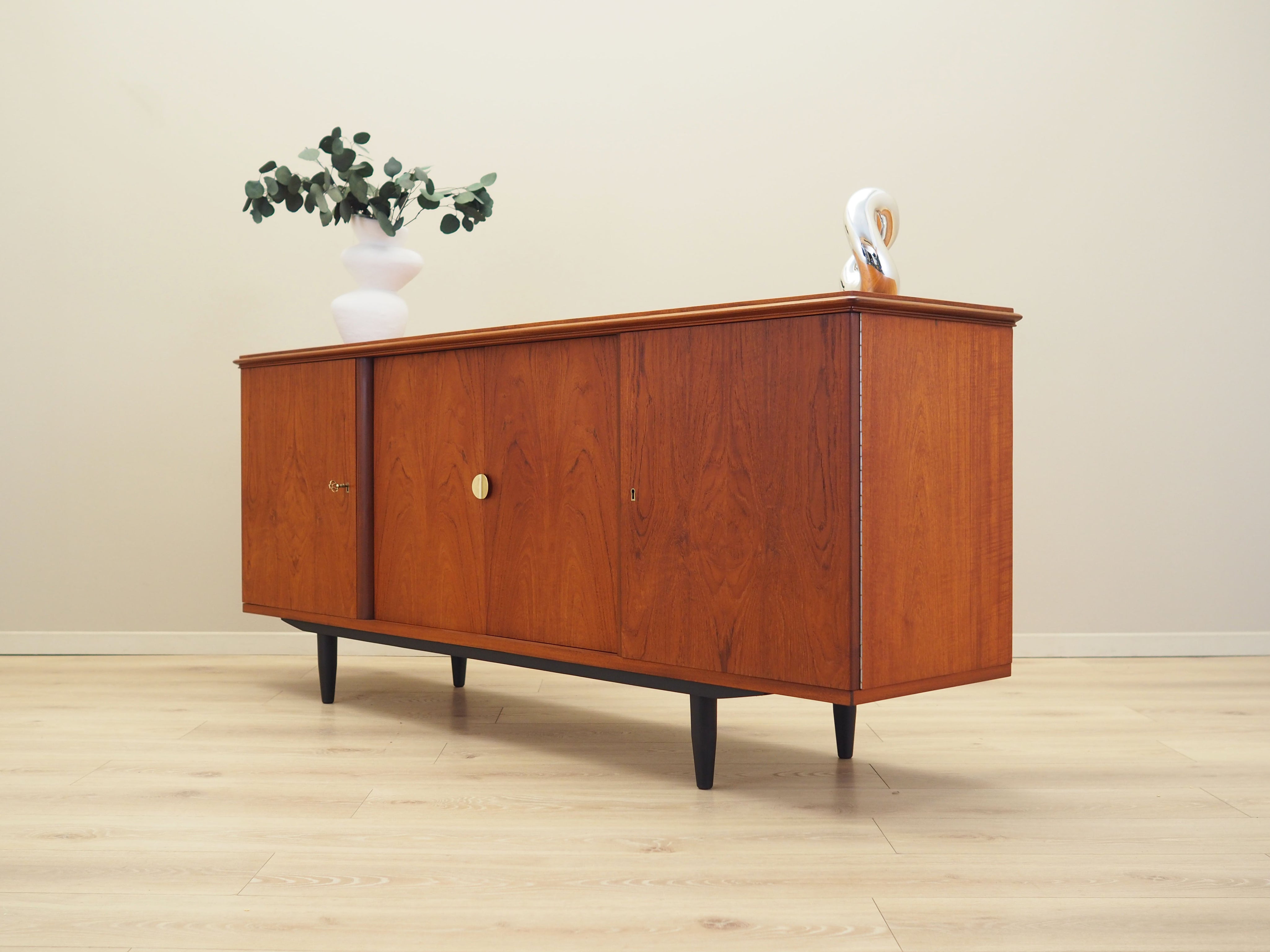Brown_Teak_sideboard_in_Danish_design_from_1970s