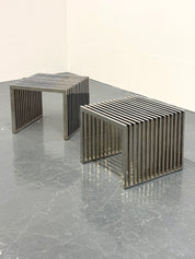 Eichholtz_Carlisle_side_table_in_polished_stainless_steel