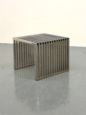 Eichholtz_Carlisle_side_table_in_polished_stainless_steel