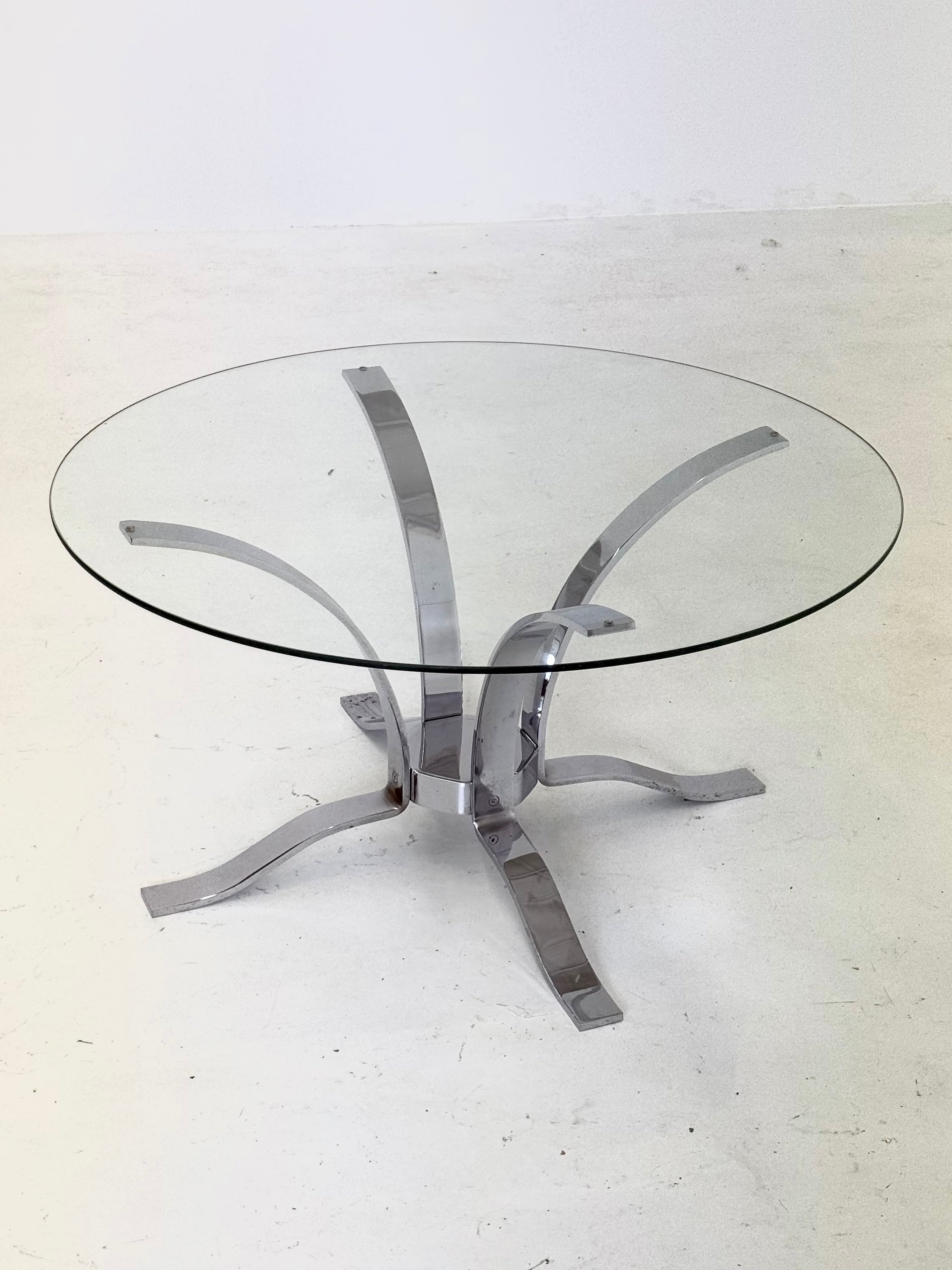Glass_mid-century_coffee_table_with_chrome_frame