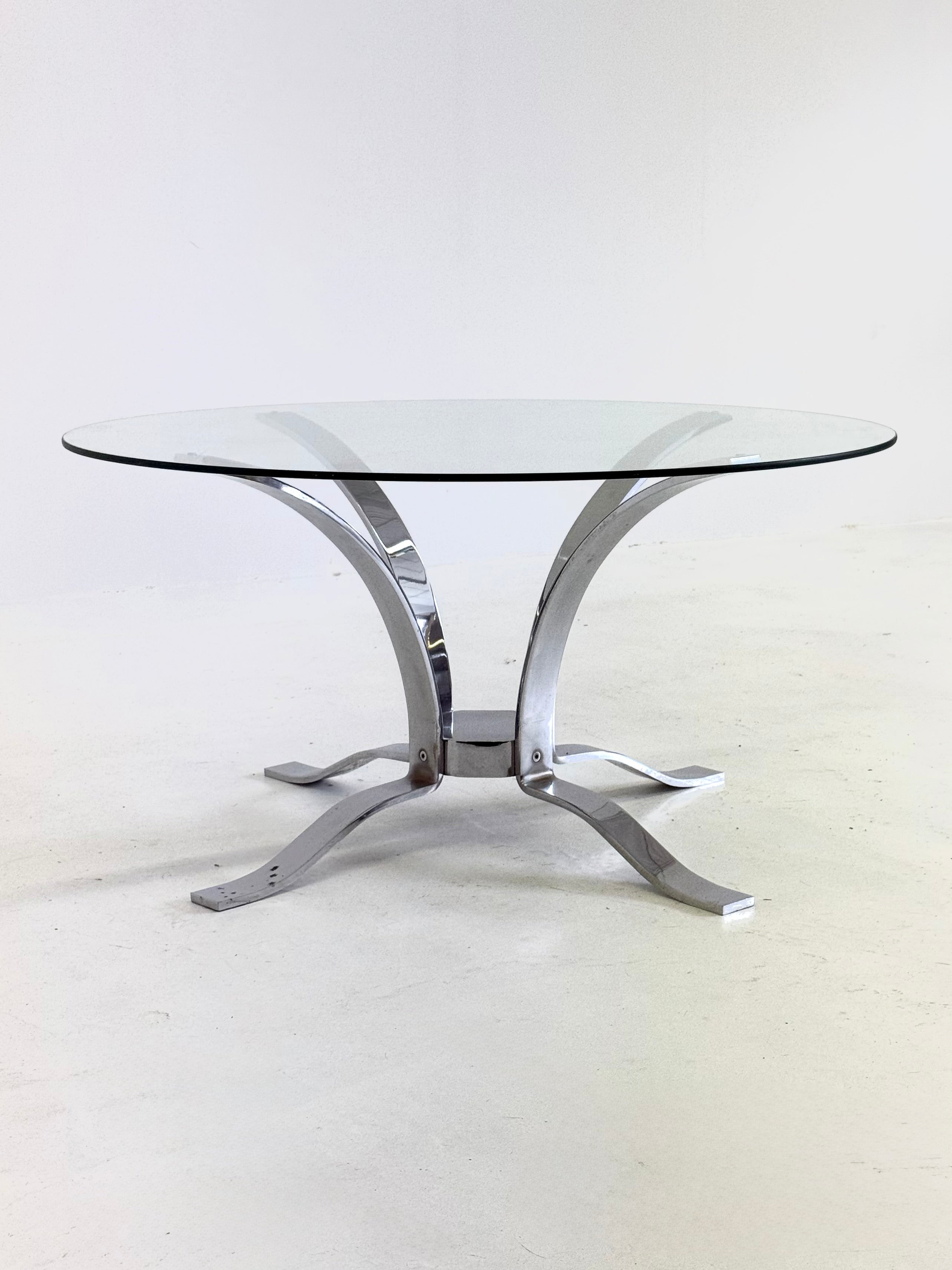 Glass_mid-century_coffee_table_with_chrome_frame
