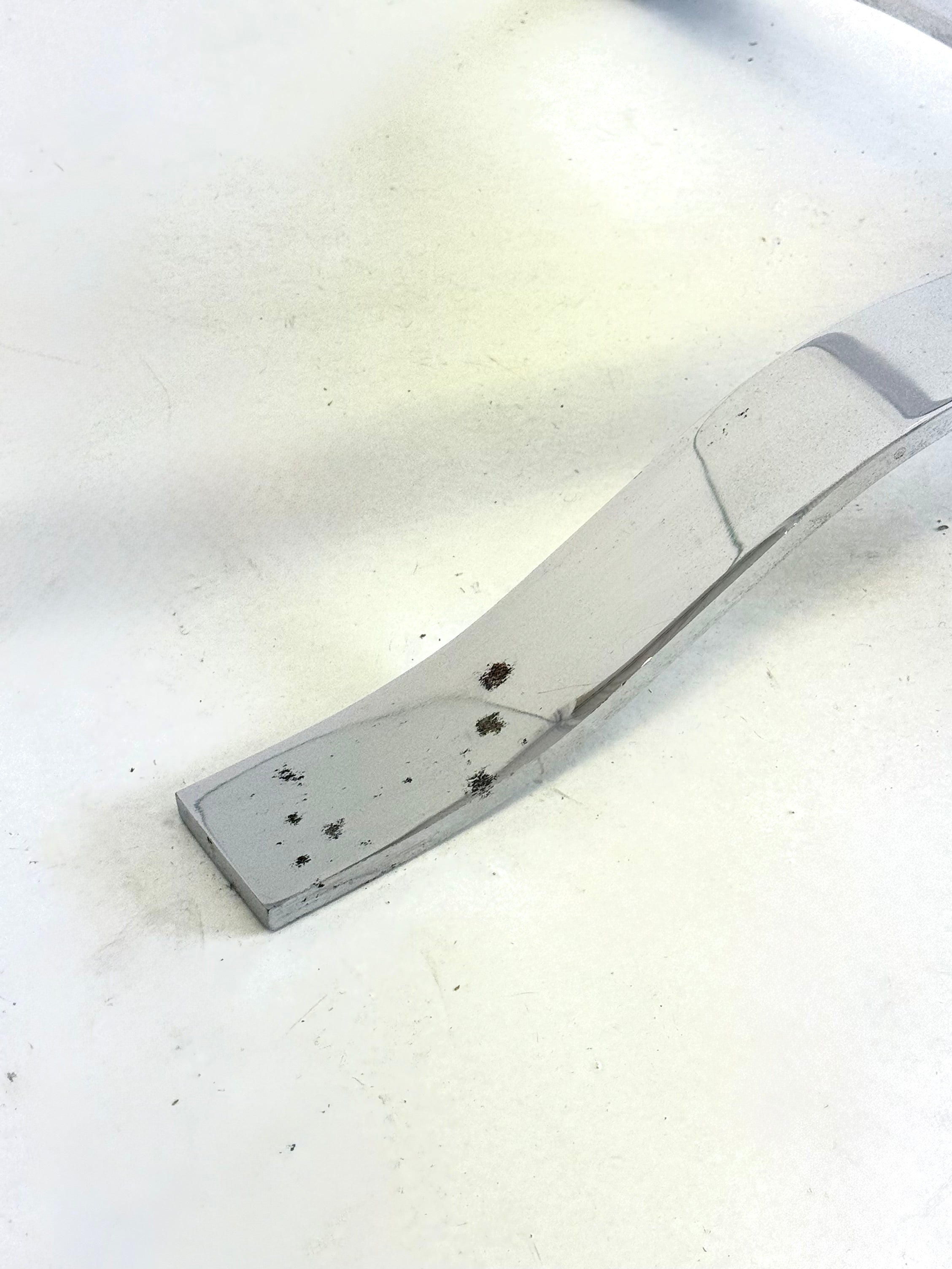 Glass_mid-century_coffee_table_with_chrome_frame