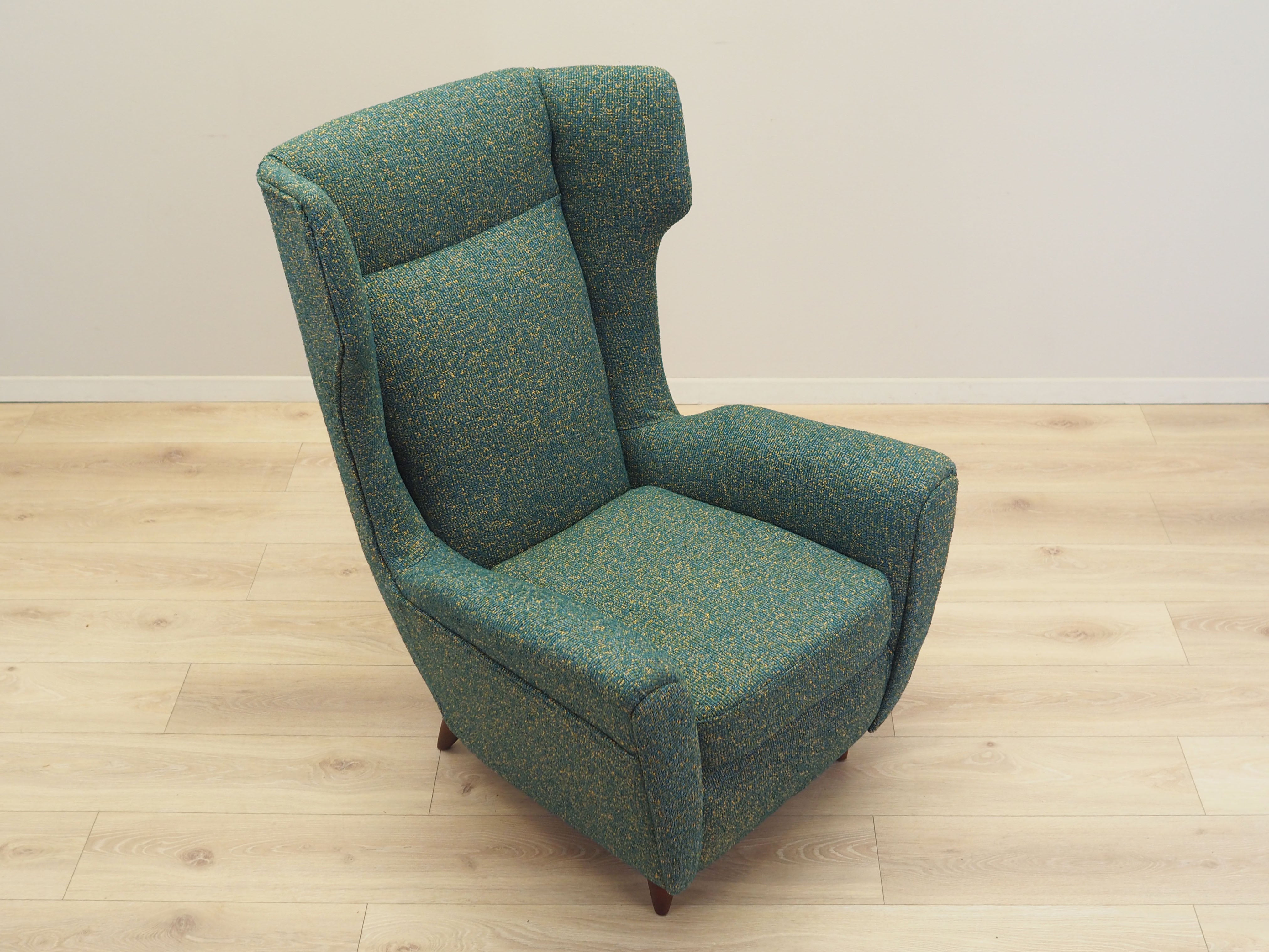 Green_armchair_Italian_design_1970s_production_Italy