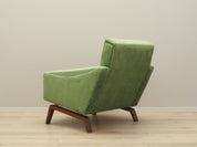 Green_armchair_in_Danish_design_1970s_production_Denmark