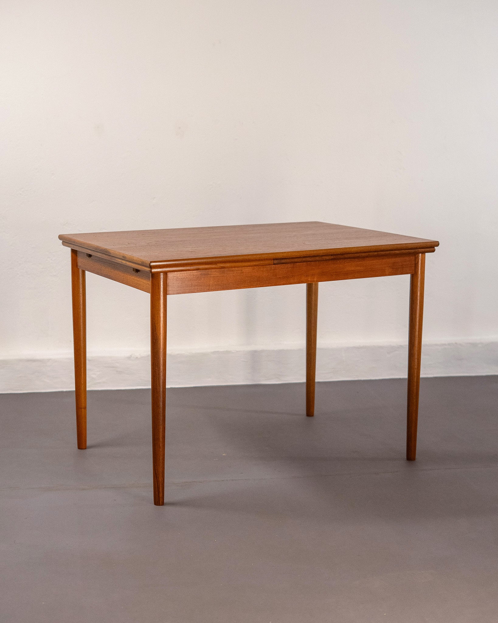 Mid_Century_Danish_Extending_Dining_Table_made_of_Teak,_circa_1960