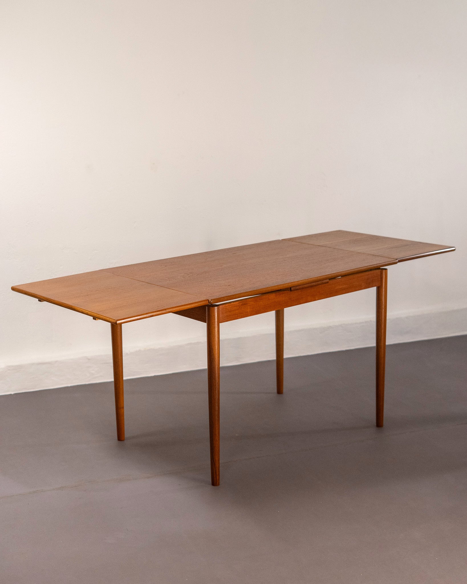 Mid_Century_Danish_Extending_Dining_Table_made_of_Teak,_circa_1960