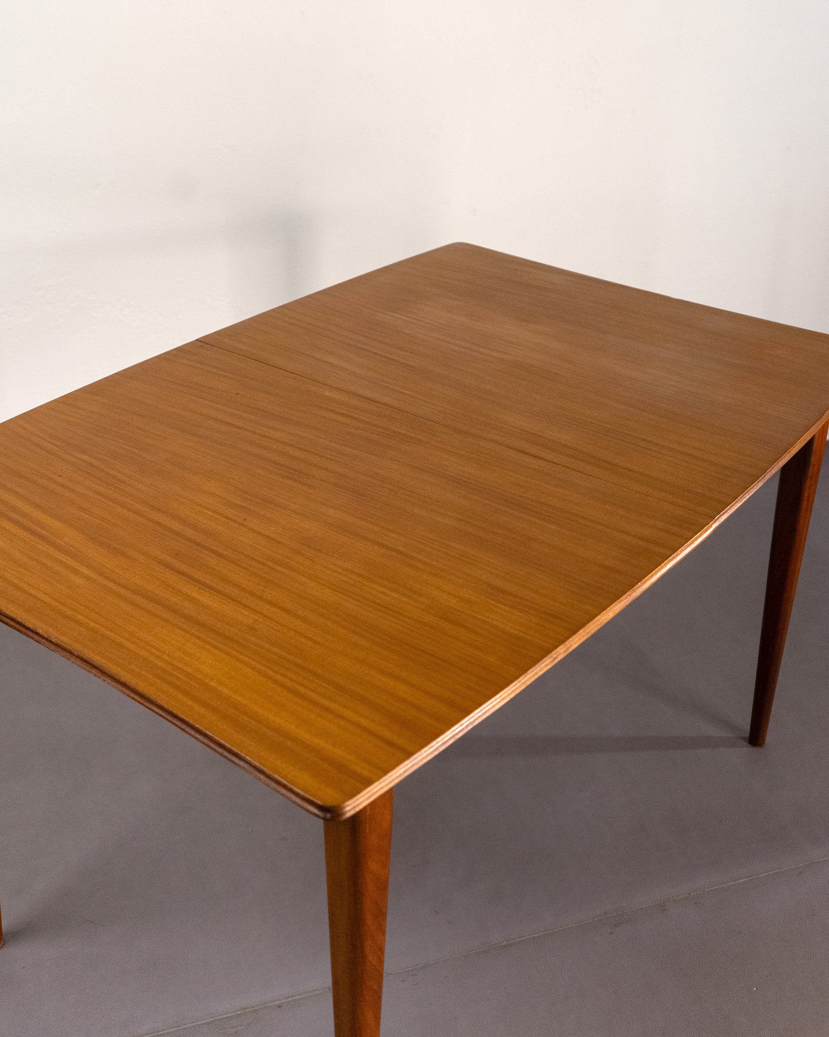 Mid_Century_Extending_Dining_Table_made_of_Teak_and_Afromosia_by_A._Younger_Ltd