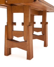 Oak_lift-and-lower_dining_table_by_Guillerme_et_Chambron