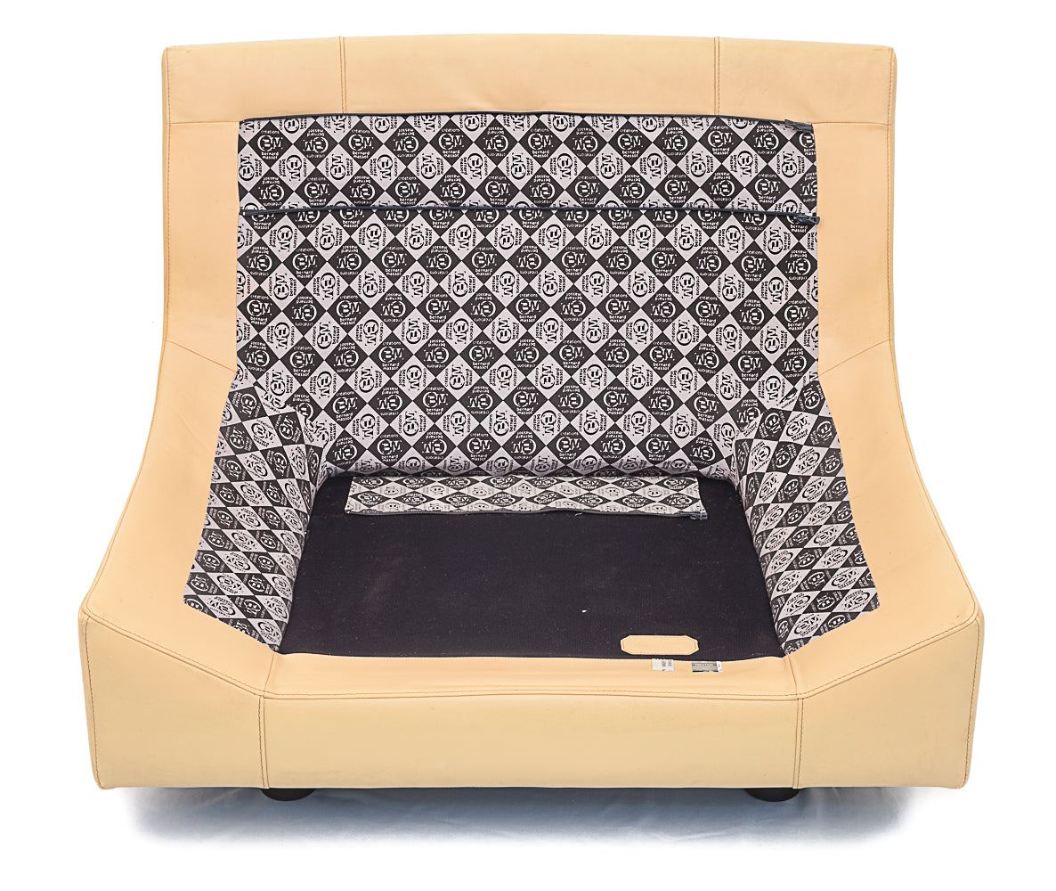 Pair_of_beige_leather_armchairs