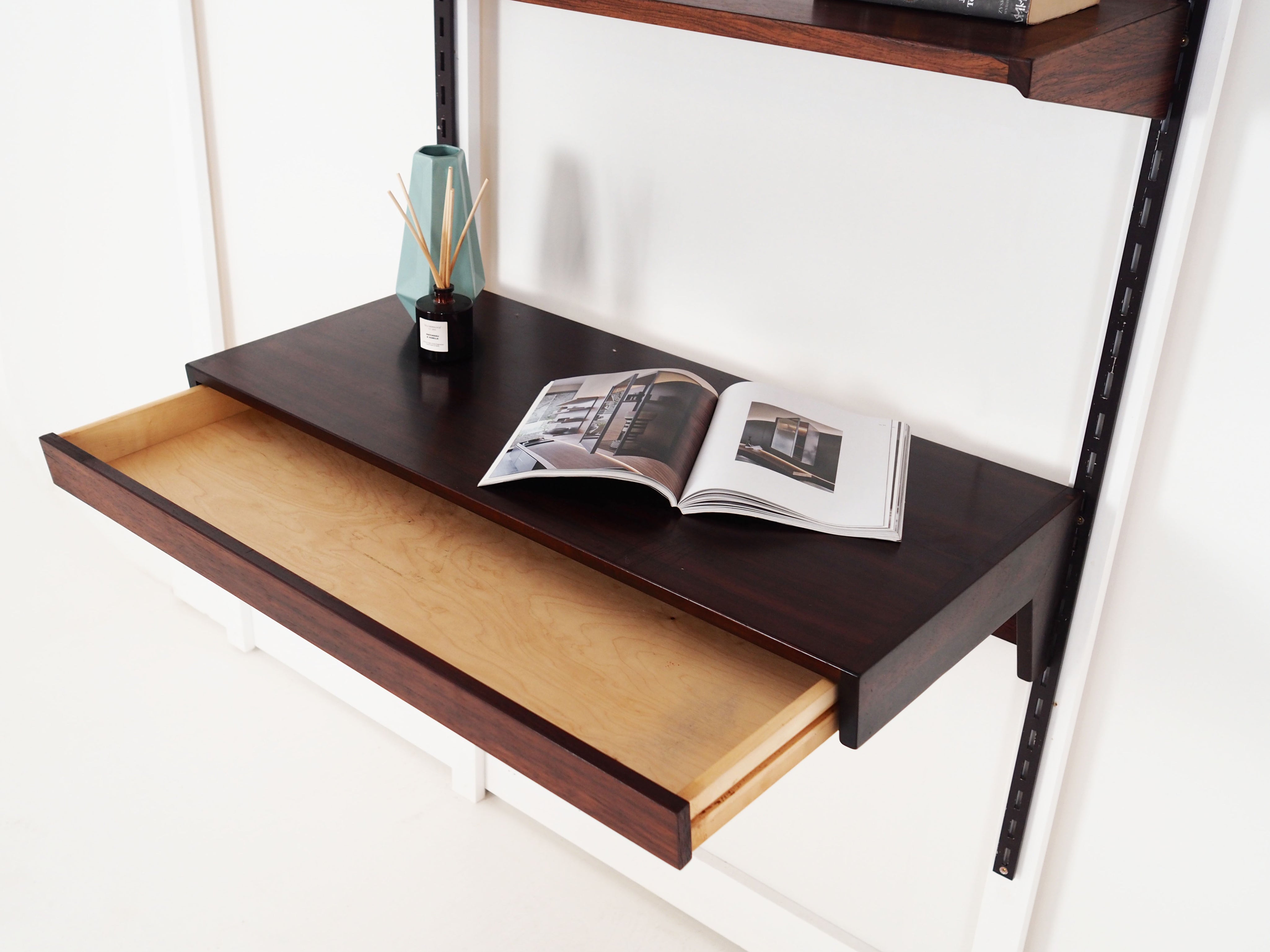 Rosewood_system_bookcase_Danish_design_1960s_production_Denmark