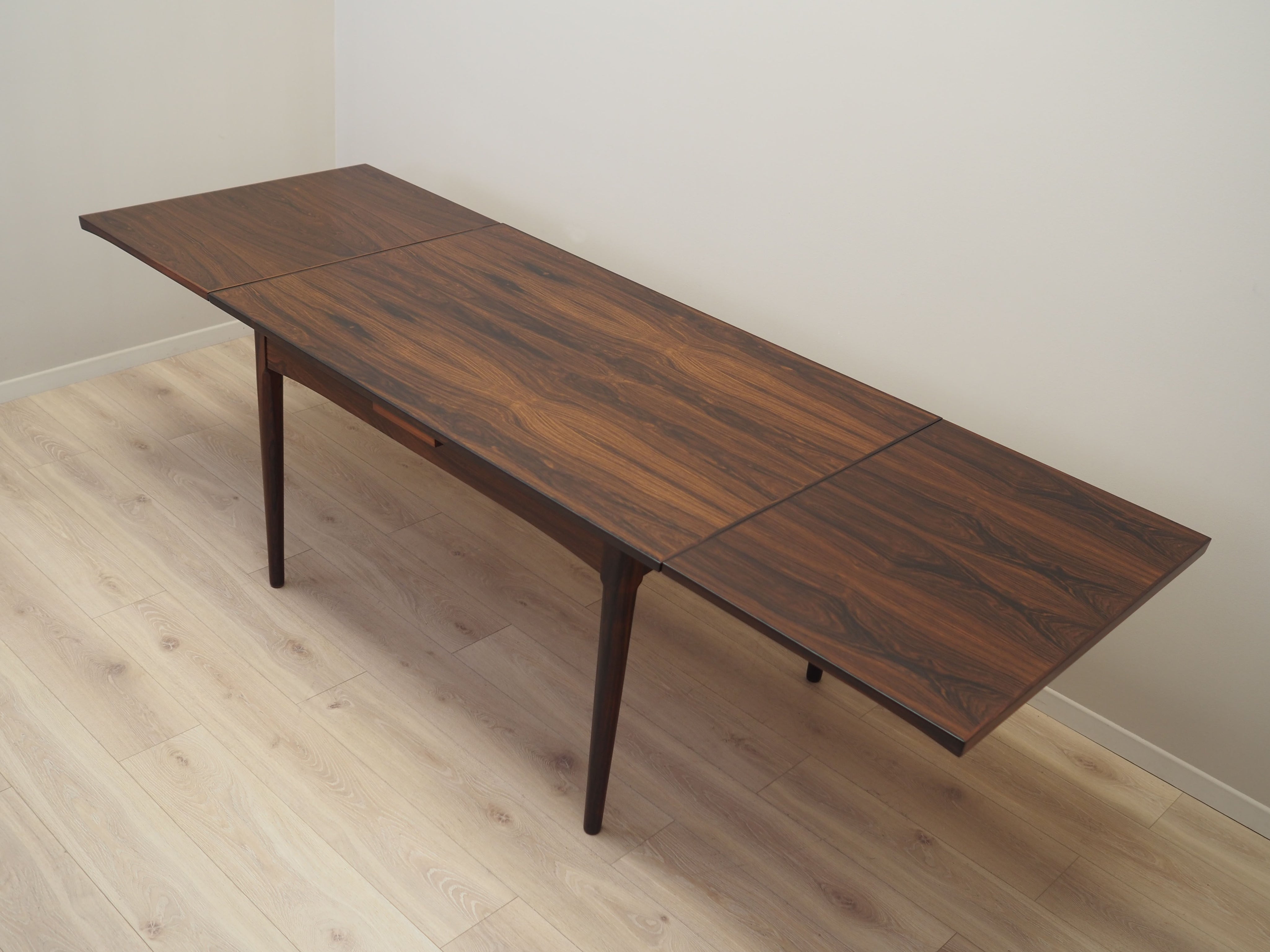 Rosewood_table_in_Danish_design_from_1970s_production_Denmark