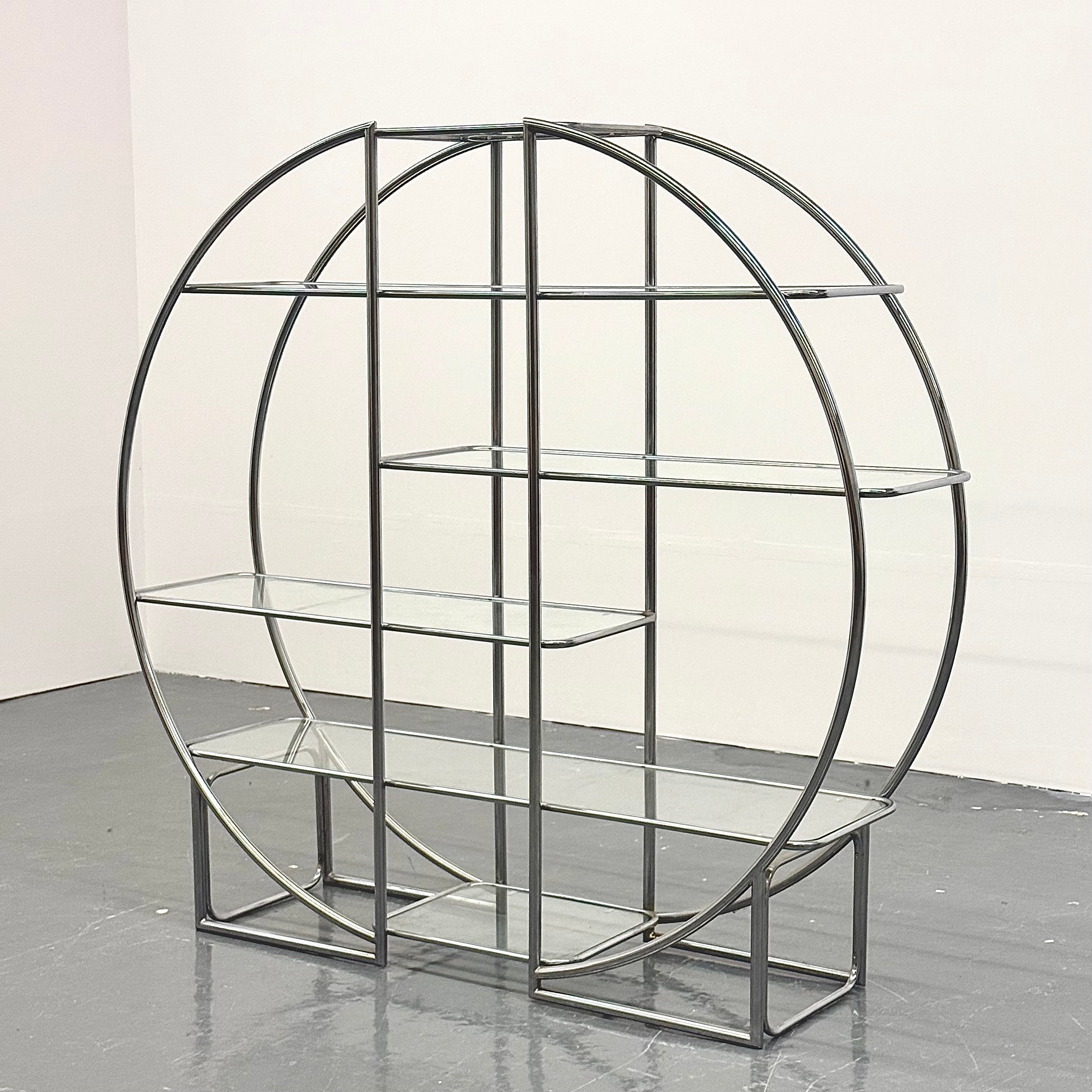 Round_Bauhaus_shelving_with_tubular_frame_and_glass_shelves