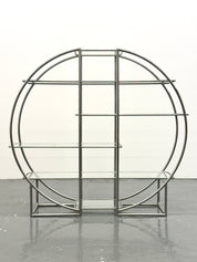 Round_Bauhaus_shelving_with_tubular_frame_and_glass_shelves