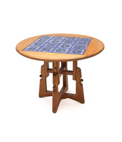 Round_dining_table_by_Guillerme_et_Chambron