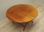 Round_mahogany_coffee_table_in_Danish_design_1970s_production_Denmark