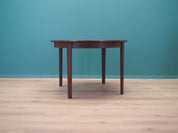 Round_rosewood_table_Danish_design_1960s_production_Denmark