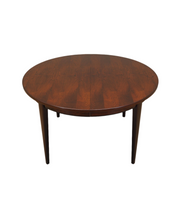 Round_rosewood_table_Danish_design_1970s_manufacturer_Omann_Jun