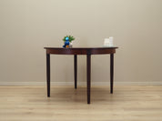 Round_rosewood_table_Danish_design_1970s_production_Denmark