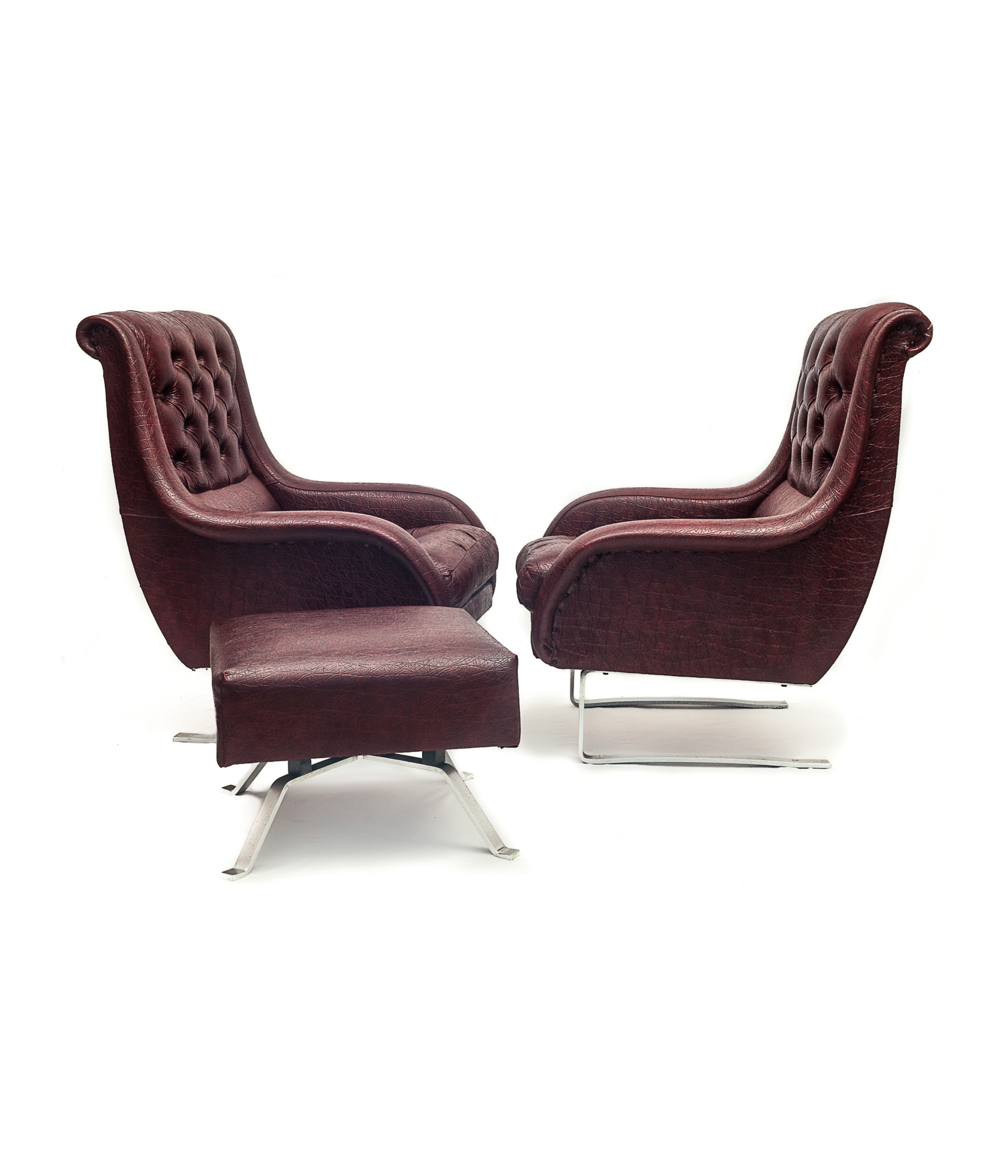 Set_of_2_high-quality_vintage_faux_leather_armchairs_with_ottoman