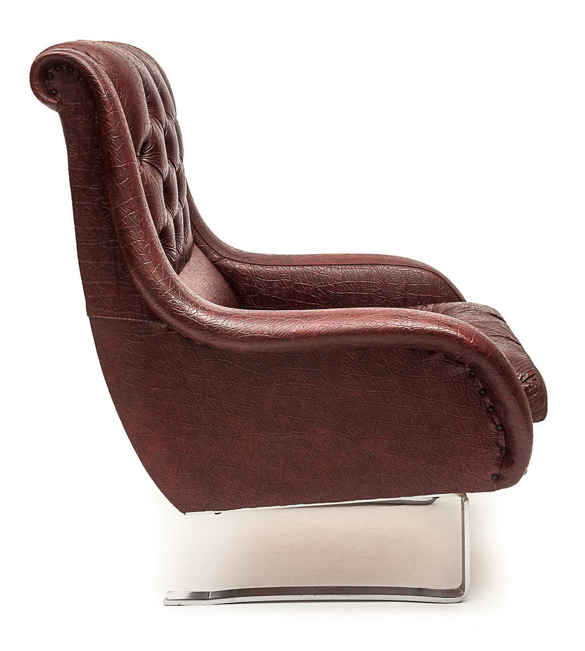 Set_of_2_high-quality_vintage_faux_leather_armchairs_with_ottoman