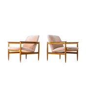 Set_of_two_mid-century_lounge_chairs_in_pink_fabric