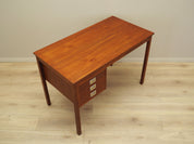 Teak_desk_in_Danish_design_from_1960s_production_Denmark