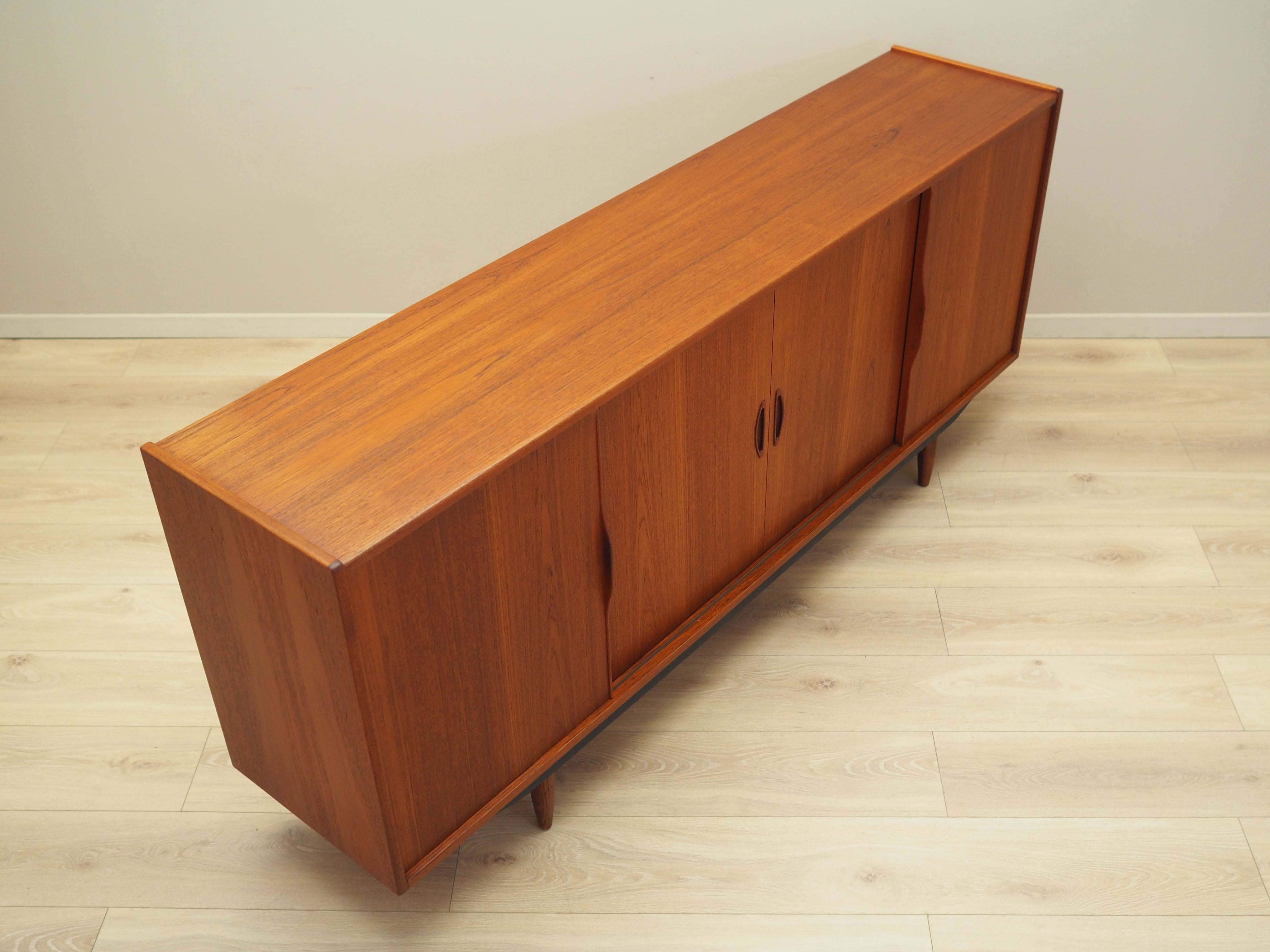 Teak_sideboard_in_Danish_design_from_1970s