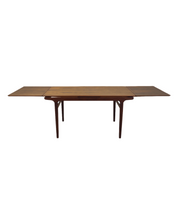 Walnut_table_Danish_design_1960s_designer_Johannes_Andersen