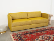 Yellow_sofa_in_Scandinavian_design_from_2000s