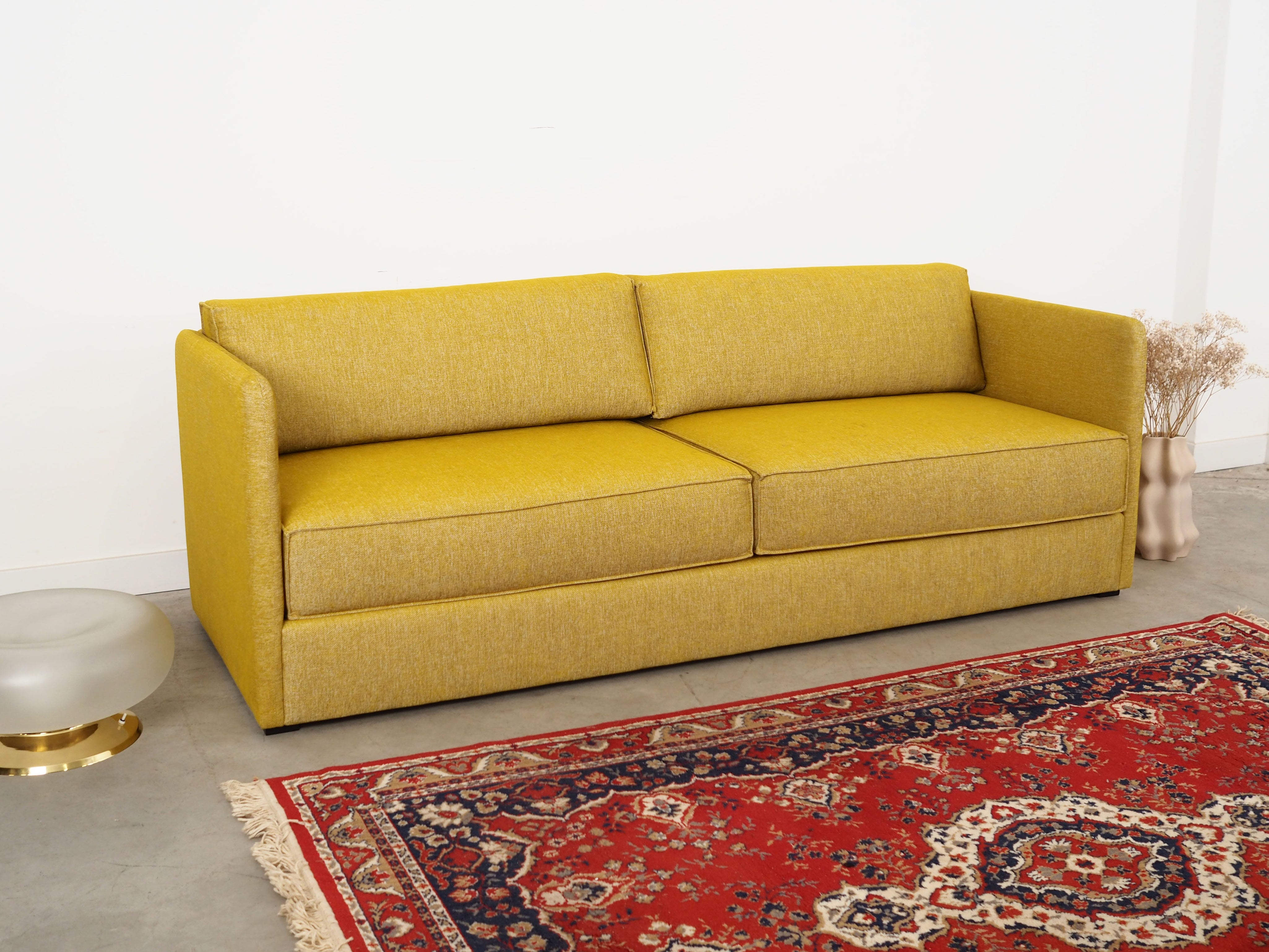 Yellow_sofa_in_Scandinavian_design_from_2000s
