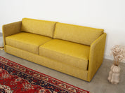 Yellow_sofa_in_Scandinavian_design_from_2000s